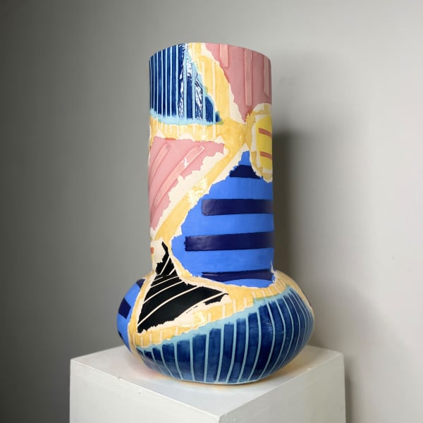 Eddie Knevett ceramic vessel designed with shaped in colours yellow, blue, pink and black