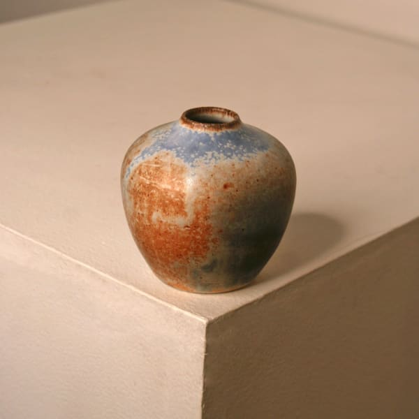 Atilla Olah ceramic mini vase in a variety of blue, green, grey and copper glaze colours