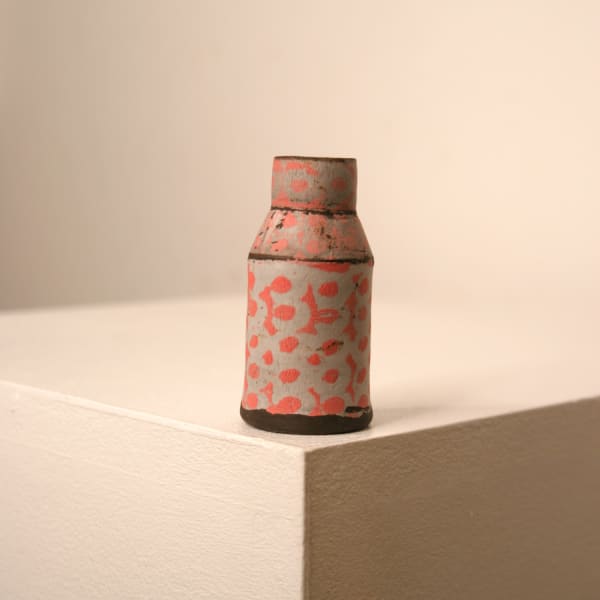 Elly Wall stoneware small ceramic bottle vase with raised bumpy texture pink glaze