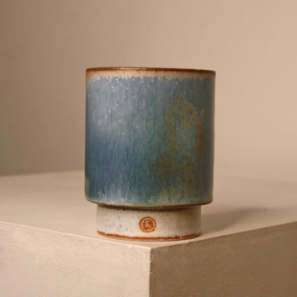 Atilla Olah ceramic yunomi cup in a variety of blue, green, grey and copper glaze colours