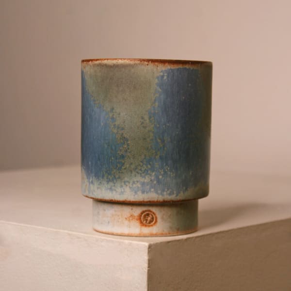 Atilla Olah ceramic yunomi cup in a variety of blue, green, grey and copper glaze colours