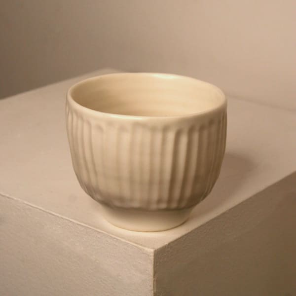 Linda Bloomfield ceramic cup with white glaze and fluted lines