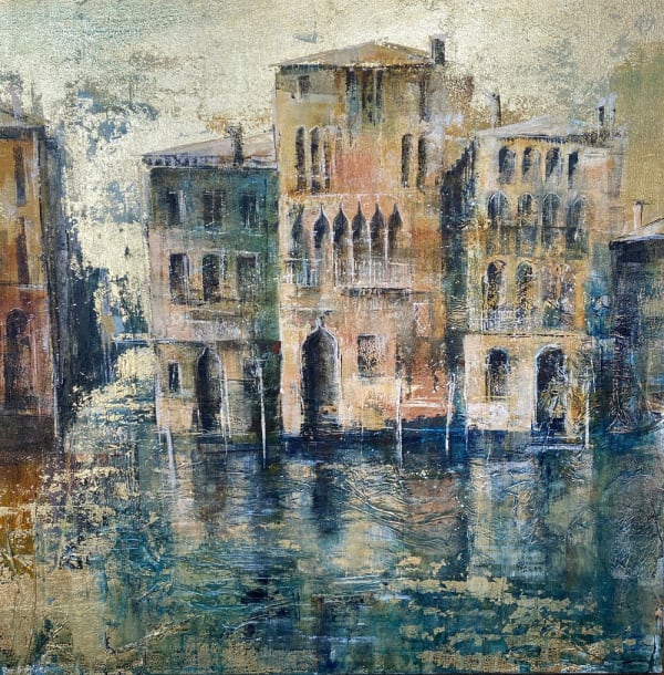 A view of Venice buildings from the canal in shades of warm browns, the canal a bright jade green colour.