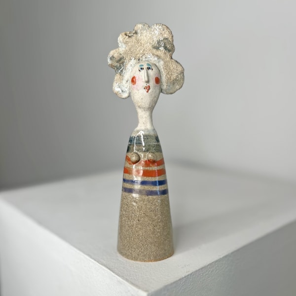 Jane Muir ceramic little lady with stoneware and blue and red rings