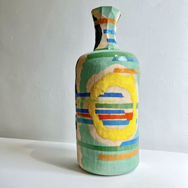 Eddie Knevett ceramic vessel designed with shaped in colours mint, yellow, blue and red