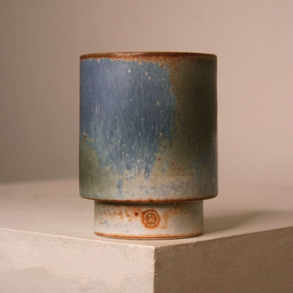 Atilla Olah ceramic yunomi cup in a variety of blue, green, grey and copper glaze colours