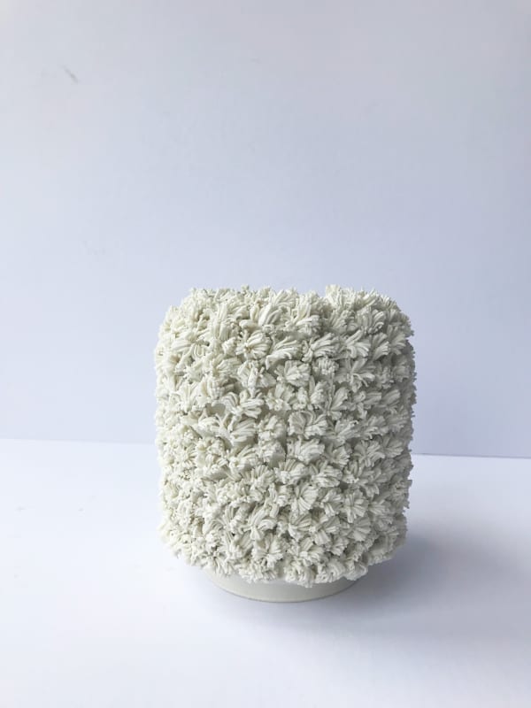 Emma Jagare hand built porcelain white vase showing dimensional detail of coral.