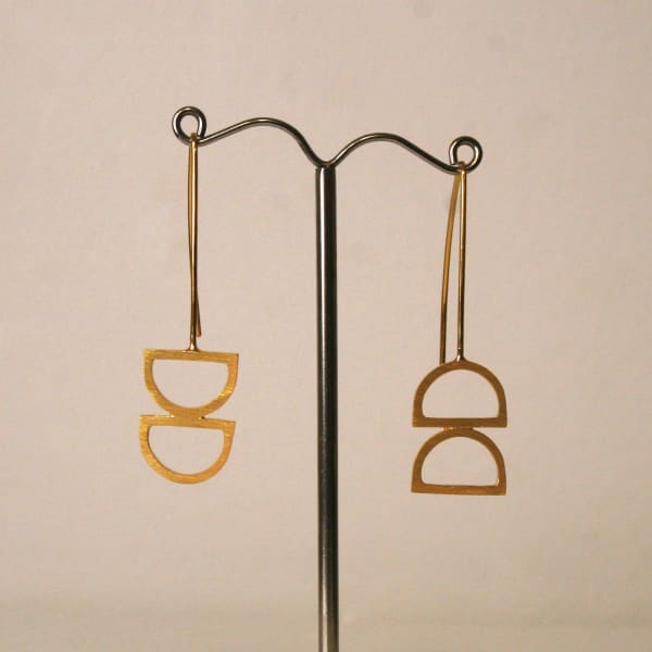 Claire Lowe Jewellery drop style earrings in gold vermeil with two semi-circular pendants at the bottom