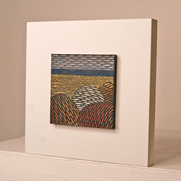 Janine Partington wooden panel with Carved leather design of a beach