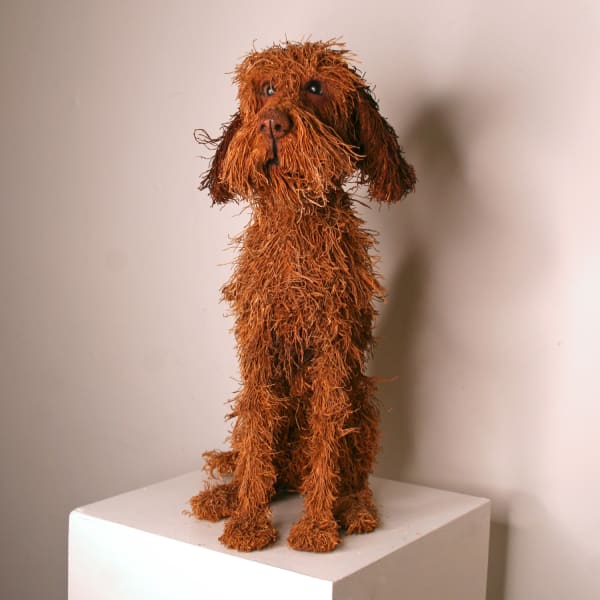 Gemma Rees mixed media sculpture of a realistic hungarian vizsla in an orange colourway and seated position