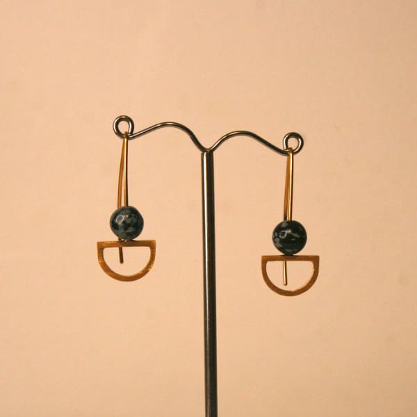 Claire Lowe Jewellery drop style earrings with obsidian beads and semi-circular pendants