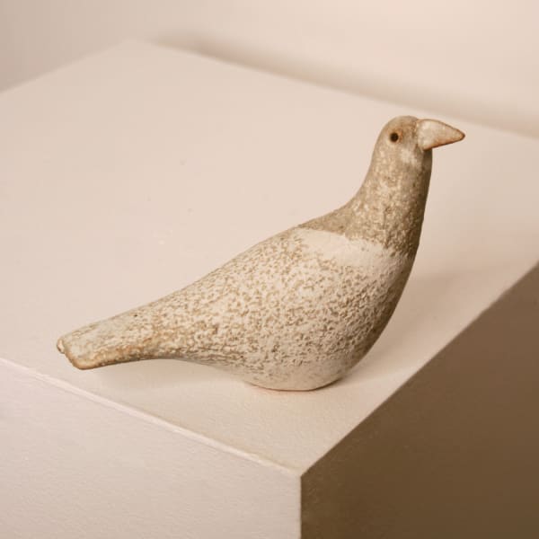 Jane Muir minimalist ceramic sculpture of a snow bird, with a speckled white matte glaze