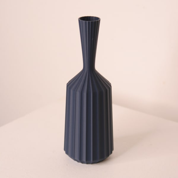 Keeley Traae 3d printed PLA vase in a pinched cone shape and dimensional zig-zagged texture, ink