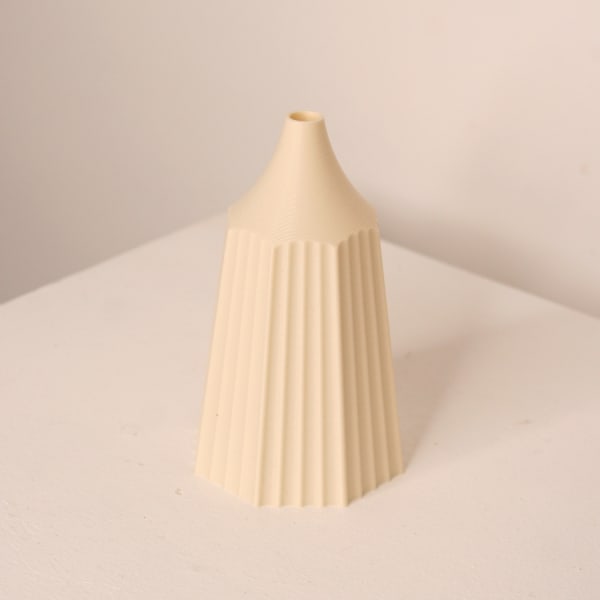 Keeley Traae 3d printed pla vase with incised line detail in a pencil shape in the colour milk