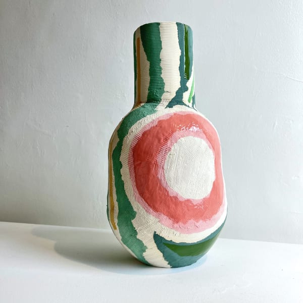 Eddie Knevett ceramic vessel designed with shaped in colours pink and green