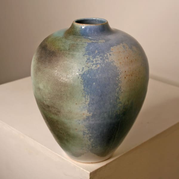 Atilla Olah ceramic vase in a variety of blue, green, grey and copper glaze colours