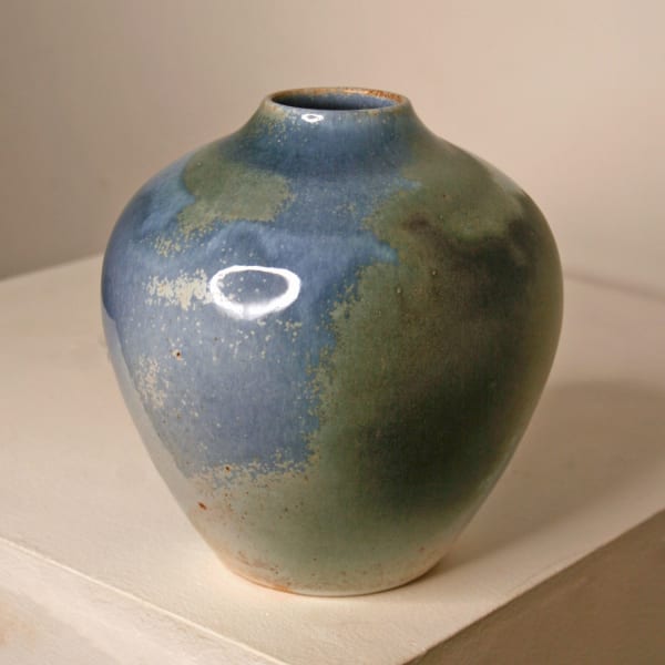 Atilla Olah ceramic vase in a variety of blue, green, grey and copper glaze colours