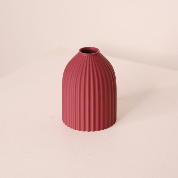 Keeley Traae 3d printed pla vase with incised line detail in curved urn shape and plum colourway