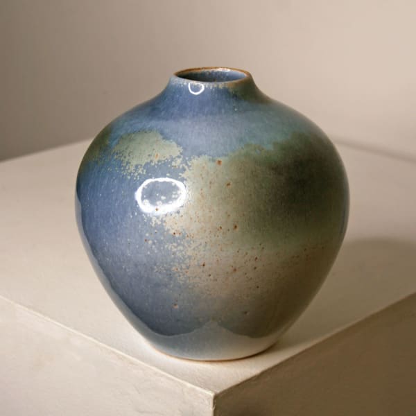 Atilla Olah ceramic vase in a variety of blue, green, grey and copper glaze colours
