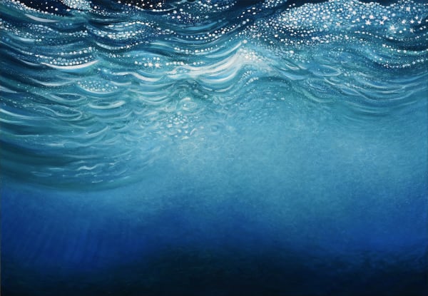 Jim Hitty underwater painting looking up at the surface, the deep blue weight of the ocean around us,