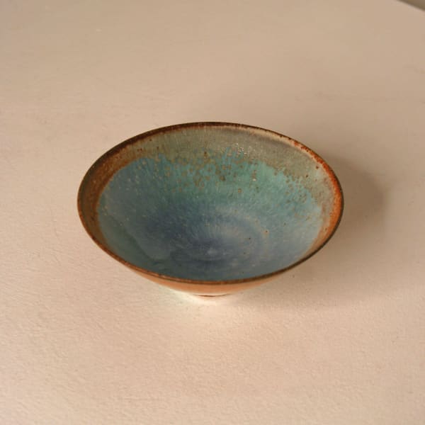 Atilla Olah ceramic mini bowl in a variety of blue, green, grey and copper glaze colours