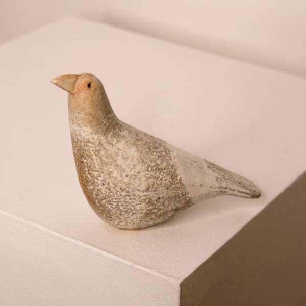 Jane Muir minimalist ceramic sculpture of a snow bird, with a speckled white matte glaze