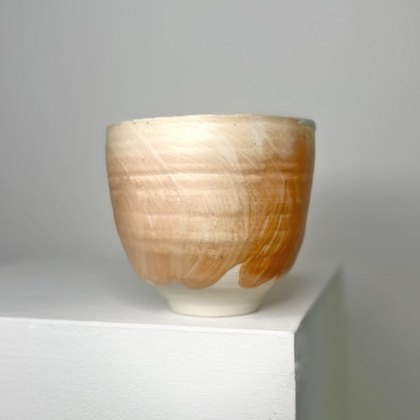 Linda Blomfield tea bowl with brushed orange and ivory glaze