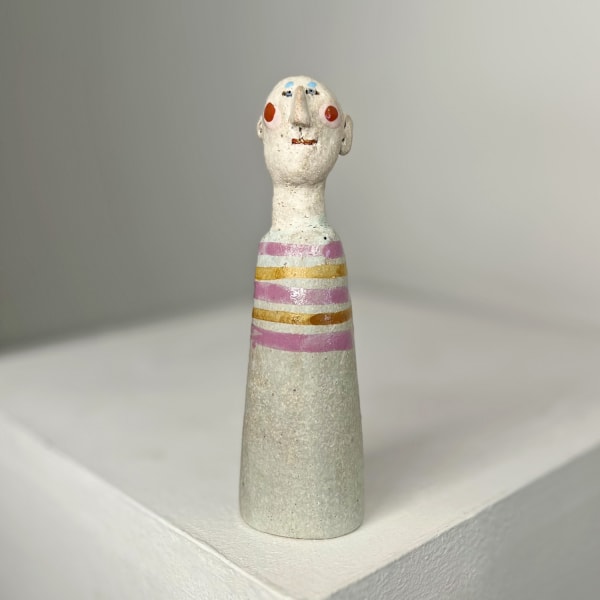 Jane Muir ceramic little man with pale blues glaze and multicoloured rings