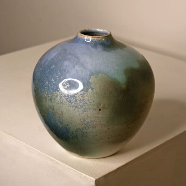 Atilla Olah ceramic vase in a variety of blue, green, grey and copper glaze colours