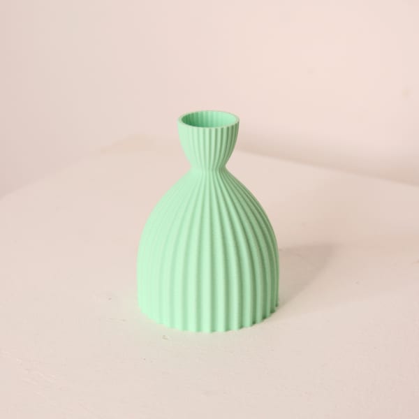 Keeley Traae PLA 3d printed rounded vase with pinches cone neck dimensional incised line texture, electric mint