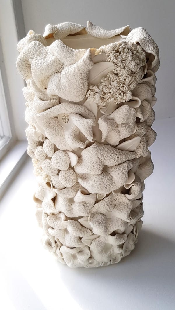 Emma Jagare hand built porcelain white vase showing dimensional detail of coral.
