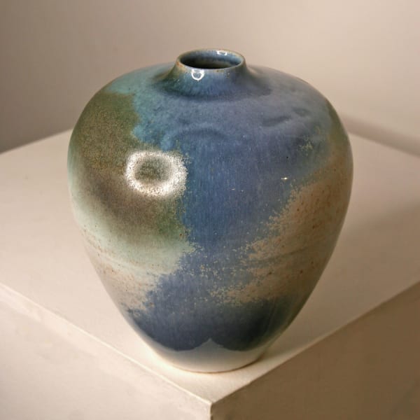 Atilla Olah ceramic vase in a variety of blue, green, grey and copper glaze colours