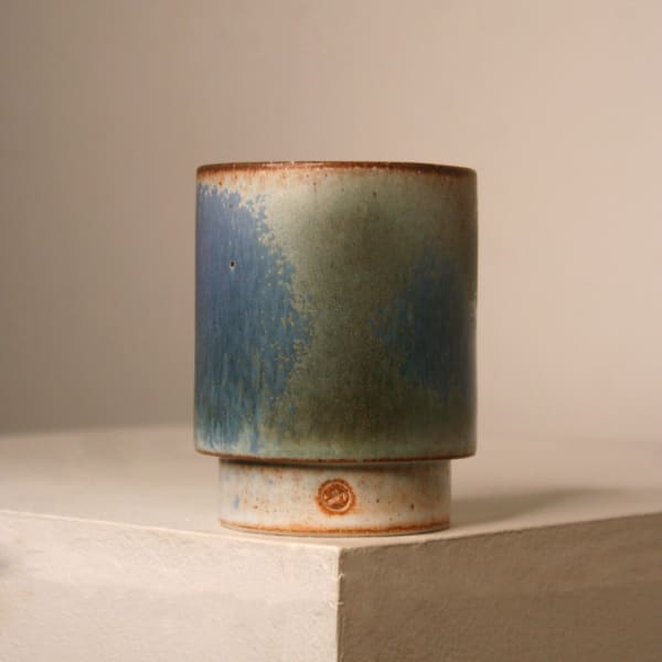 Atilla Olah ceramic yunomi cup in a variety of blue, green, grey and copper glaze colours