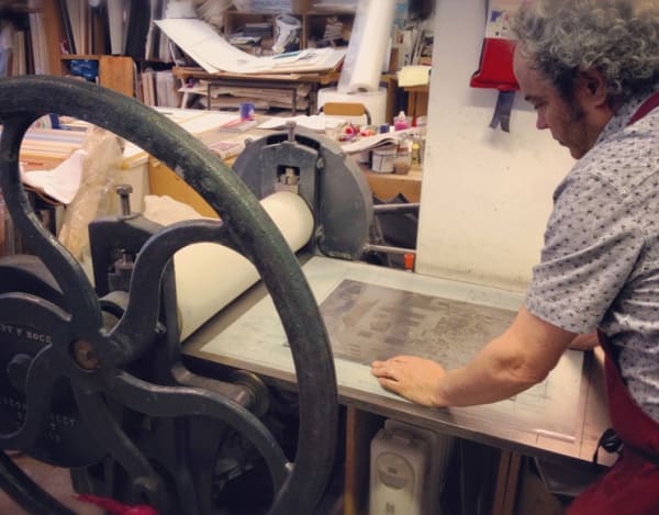 Mychael Barratt at work in his London printing studio.