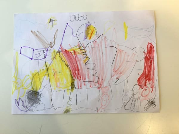 A child's drawing of a dog with many expressive lines and shapes