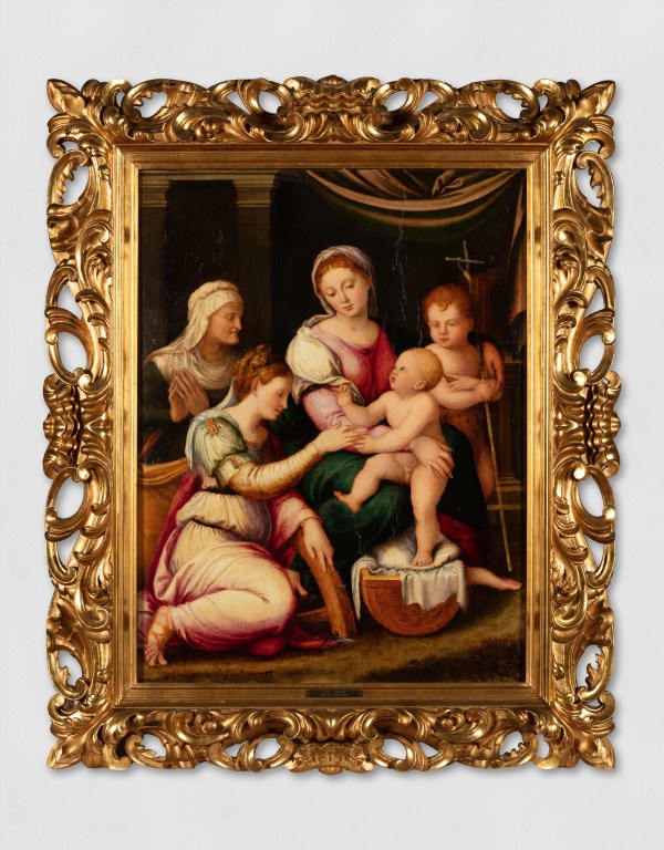 An oil painting of the mystical marriage of Saint Catherine to baby Jesus.