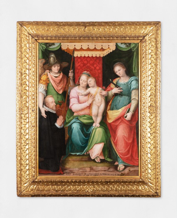 An oil painting of the Virgin Mary and Jesus Christ along with St. Michael the Archangel, St. Apollonia and a devoted knight.
