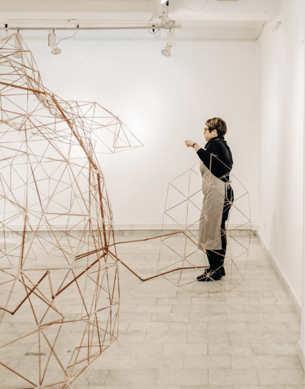 Artist installing work