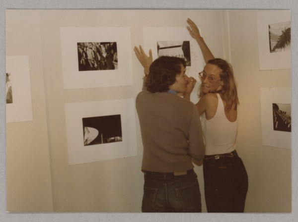Tina and Andy hanging her first show at The Potatoe Gallery, May 1977. Photo by Mary Rolland.