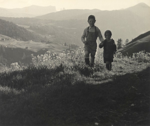 George Bunzl, Untitled (Two children walking through hills), c. 1930