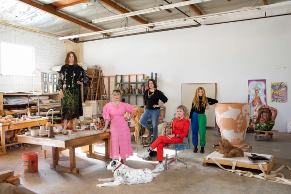 From left: Artists Ruby Neri, Lily Stockman, Megan Reed, Hilary Pecis, and Austyn Weiner (with their dogs, Dolly, Jake, Mango, and Pablo). Photo: Laure Joliet