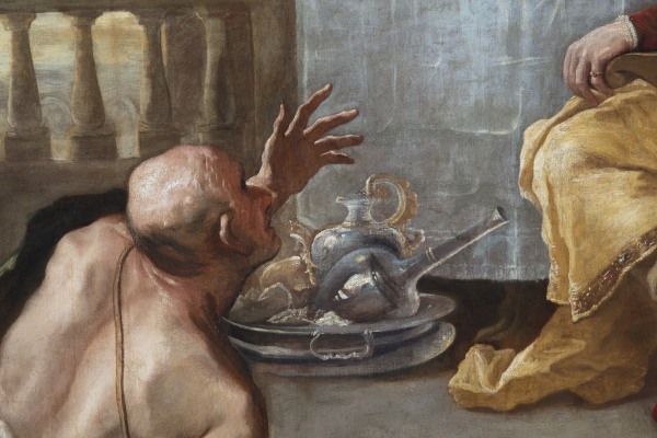 Detail of an oil painting of the rich man and Lazarus parable found in the gospel of Luke 16: 19–31. The painting depicts a rich man with empty plates, surrounded by servants after finishing his meal, while in the foreground is the beggar Lazarus.