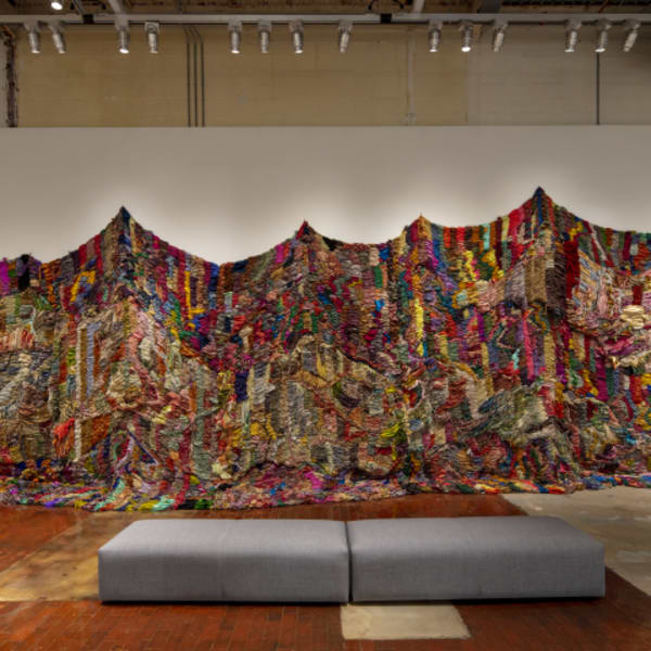Suchitra Mattai , “Exodus” (2019 ), vintage saris from India; Sharjah; and artist’s Indo-Guyanese family; and rope net, 180 x 480 inches (image courtesy K Contemporary Art and the artist . On view at the Momentary)