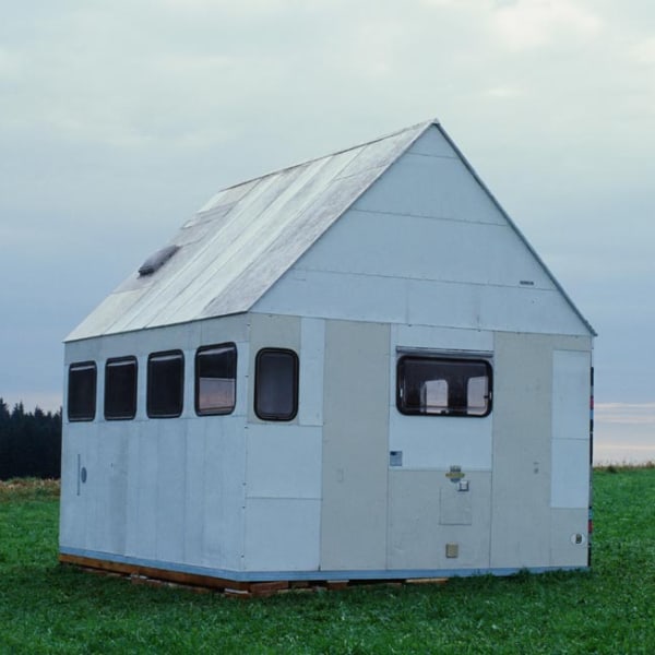 Michael Sailstorfer 'Heimatlied', 2001, 4 camper vans, wood, electricity, water, 375 x 360 x 410 cm (Courtesy of CARBON 12 and the Artist)