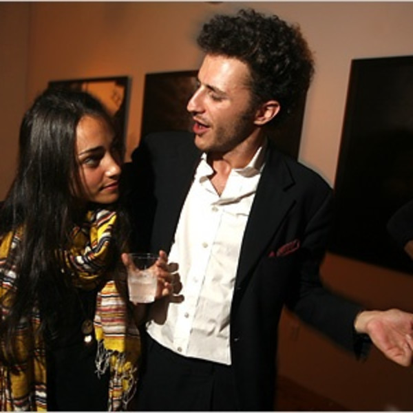 IN THE PICTURE Katie Schecter, left, with Carlo von Zeitschel at his gallery party and book signing for the photographer Paolo Pellegrin. Credit Rahav Segev for The New York Times
