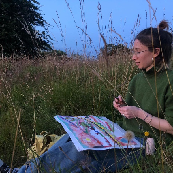 Lucy painting en plein air
