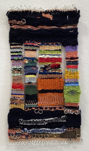 Jana Ghalayini Perpetual lines of columns in Character, 2022 Handwoven tapestry on a frame loom Cotton, wool, acrylic yarn and metal rings 41 x 22 cm 16 1/4 x 8 3/4 in