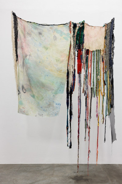 Jana Ghalayini Jellyfish, 2023 Collage of handwoven cotton, wool and acrylic yarn weavings made on a counterbalance floor loom, small cotton, paper and mixed media weavings done using tapestry techniques on a frame loom, fabric scraps, hand painted polyester chiffon using fabric paint 250 x 170 cm 98 1/2 x 67 in