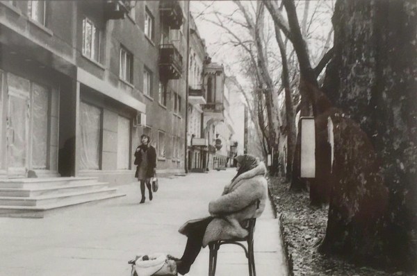 Nicholas Hopkins, Woman Street Seller on a cold day, 22nd April 2003