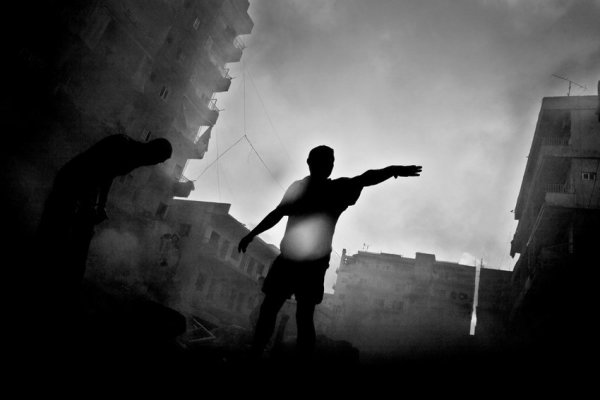 Paolo Pellegrin, Moments after Israeli aircraft hit a building in downtown Tyre., July 2006